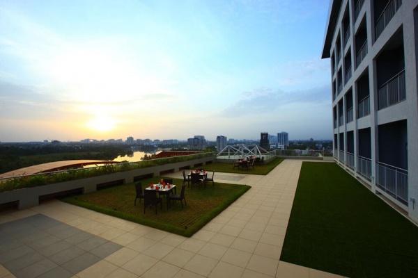 Starlit Suites Cochin - Rooftop Garden at Dawn