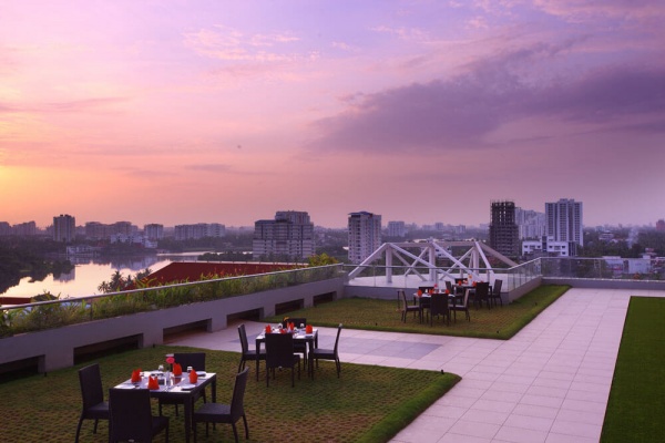 Starlit Suites Cochin - Rooftop Garden in the Evening