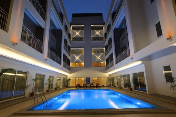 Starlit Suites Cochin - Swimming Pool by Night